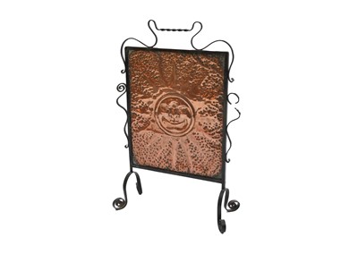 Lot 438 - A wrought iron and copper fire screen