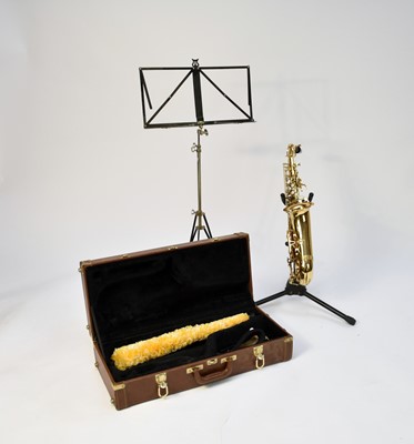 Lot 445 - A cased Blessing alto saxophone with accessories