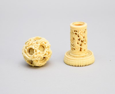 Lot 105 - A Chinese ivory puzzle ball on stand