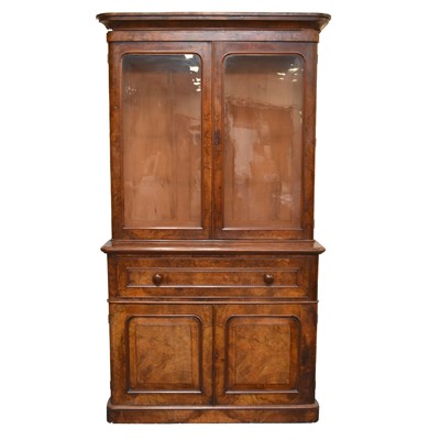 Lot 473 - A 19th century walnut secretaire bookcase