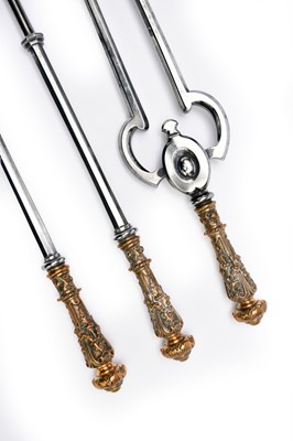 Lot 344 - A set of Georgian cast brass and steel fire tools