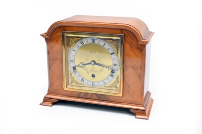 Lot 454 - A walnut cased Elliott mantel clock for Charles Fox, Bournemouth