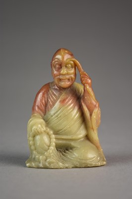 Lot 140 - A Chinese carved soapstone figure of a seated luohan