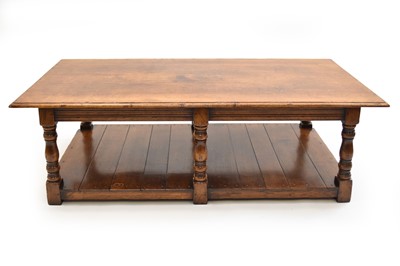 Lot 513 - An 18th century style oak coffee table by Arighi Bianchi