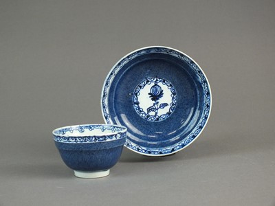 Lot 542 - An unusual English pearlware tea bowl and saucer, circa 1790