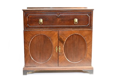 Lot 388 - A George III mahogany secretaire cabinet