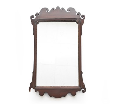 Lot 823 - A George III style mahogany fret type wall mirror