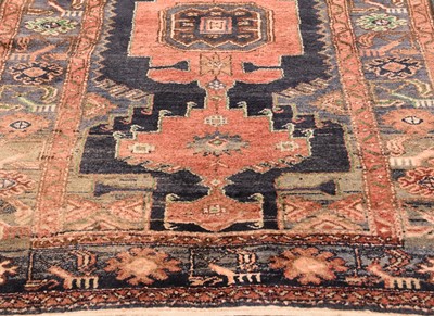 Lot 416 - A Persian geometric pattern rug in russet tones, an Anatolian rug and two further rugs