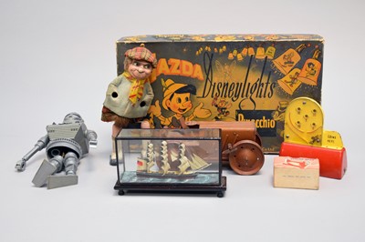 Lot 277 - A collection of vintage toys including a Tri-Ang tractor