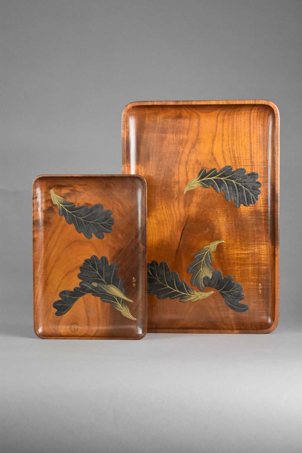 Lot 180 - Two Japanese lacquered wood trays, Taisho era or later