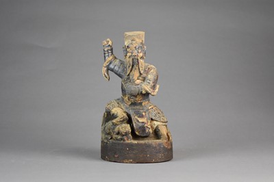 Lot 95 - A Chinese lacquered wood guardian figure or demon, Ming Dynasty