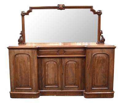 Lot 784 - A mid-Victorian mahogany mirror-back breakfront sideboard