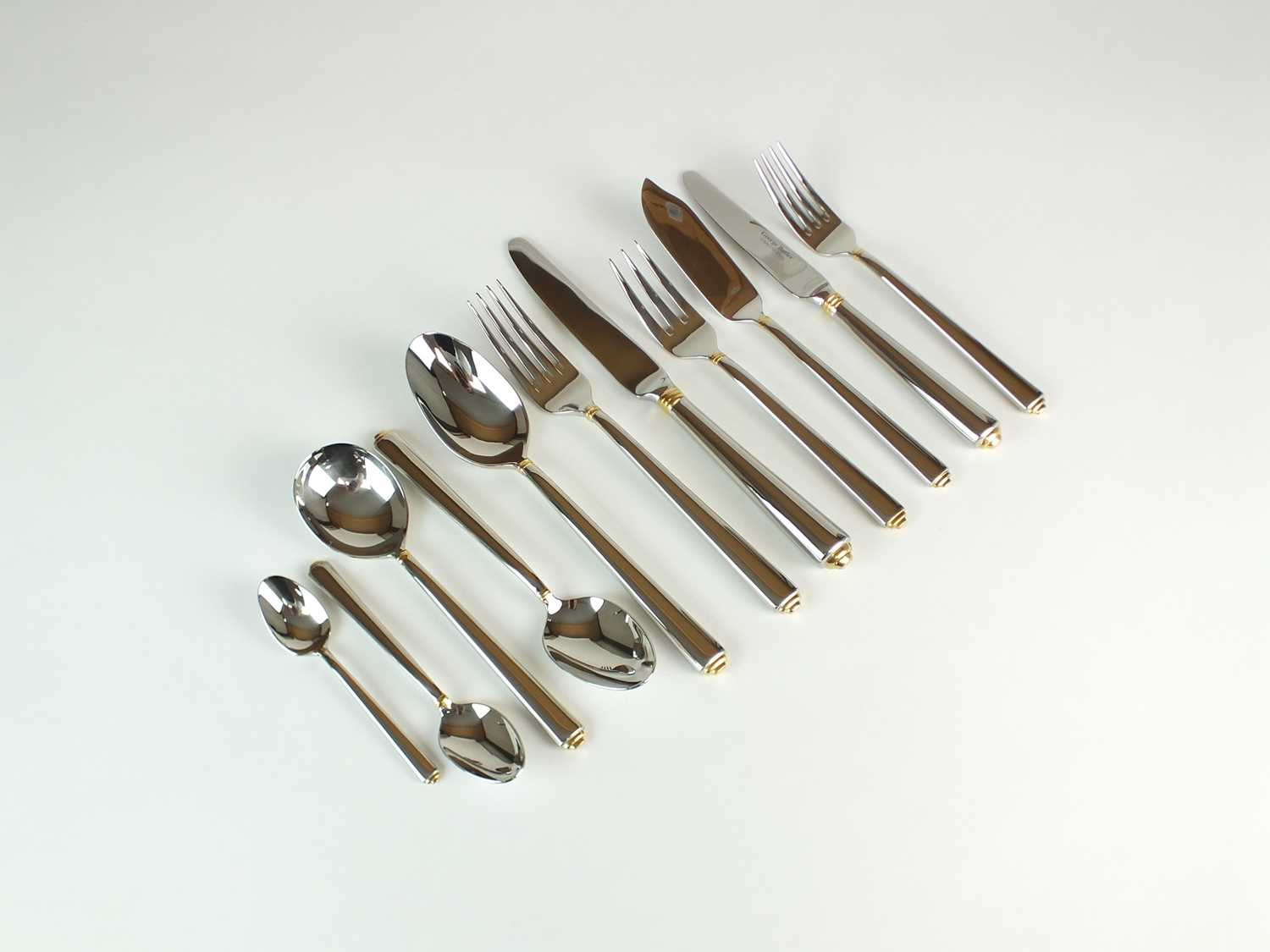 Lot 3 - A twelve setting canteen of George Butler stainless steel gold highlight cutlery