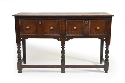 Lot 382 - An 18th century oak geometric dresser base