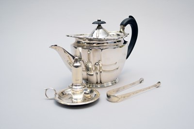 Lot 37 - A silver teapot, pair of sugar tongs and taperstick