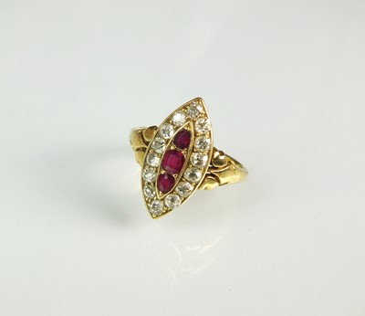 Lot 95 - A late 19th century ruby and diamond marquise shaped ring