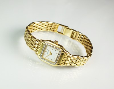 Lot 350 - A 9ct yellow gold and diamond Accurist bracelet wristwatch