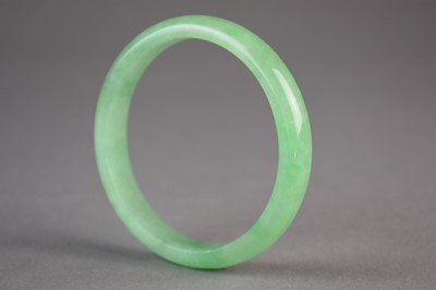 Lot 617 - A Chinese jadeite bangle