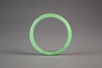 Lot 617 - A Chinese jadeite bangle