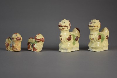 Lot 31 - Two pairs of Chinese glazed lion figures from the Diana Cargo, circa 1816