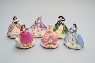 Lot 544 - A set of six Coalport miniature 'Fairest Flowers' ladies