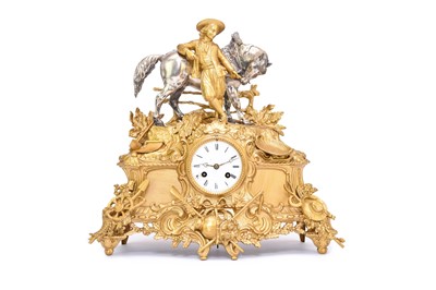 Lot 270 - A large French gilt and silvered metal mantel clock