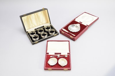 Lot 201 - Silver napkin rings, butter dish and salts