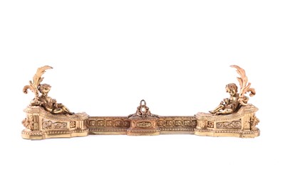 Lot 251 - A French gilt bronze figural fire fender