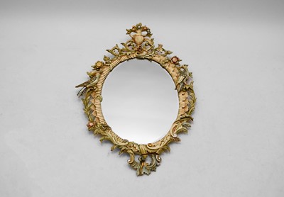 Lot 617 - An Italian carved and painted wood rococo style wall mirror