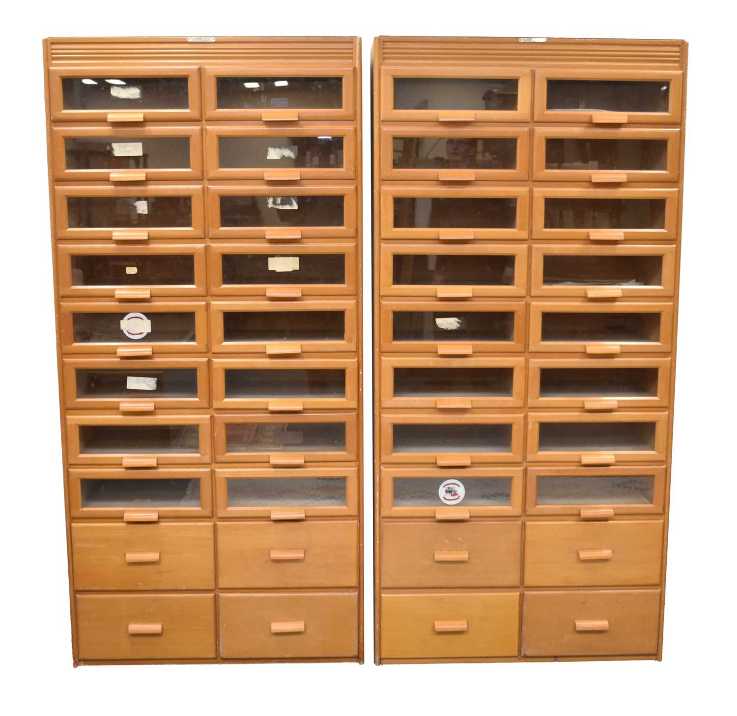 Lot 796 - Two mid 20th century beech glazed haberdashery cabinets