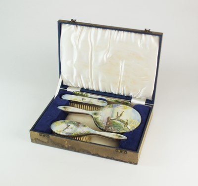 Lot 10 - A cased silver and enamel dressing table set