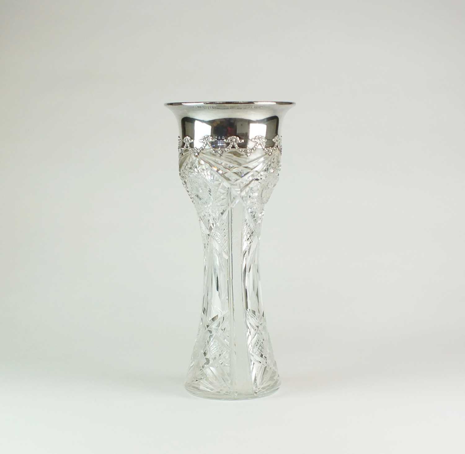 Lot 14 - A large silver mounted cut glass vase