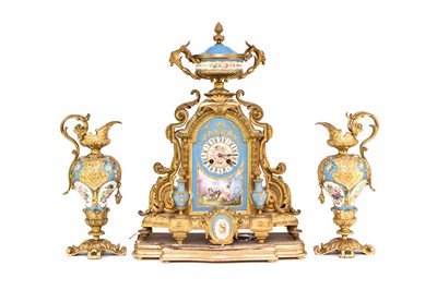 Lot 269 - A French ormolu and porcelain clock garniture