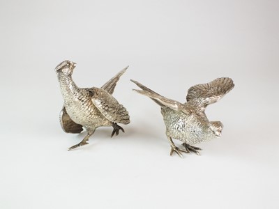Lot 15 - A pair of silver ornaments modelled as pheasants