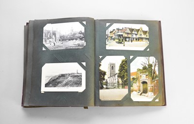 Lot 287 - An early 20th century album of mainly topographical postcards