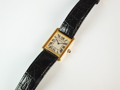 Lot 153 - A Cartier gold plated Tank Solo quartz wristwatch