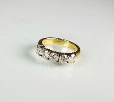 Lot 111 - An 18ct gold five stone diamond ring