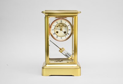 Lot 303 - A 20th century brass, four glass clock