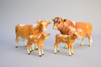 Lot 562 - Beswick Guernsey cattle family group