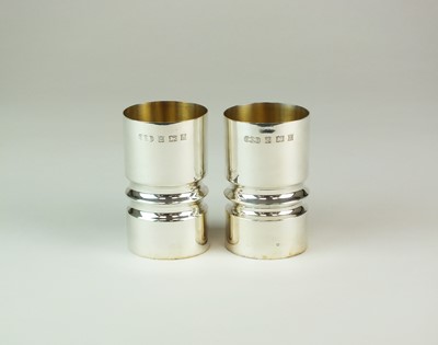 Lot 49 - A pair of modern silver beakers
