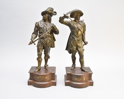 Lot 687 - Two bronzed alloy figures of Cavaliers