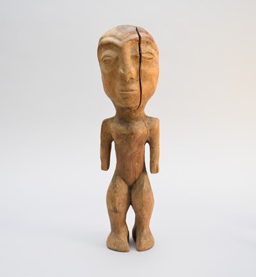 Lot 230 - A Native American carved cedar wood standing figure