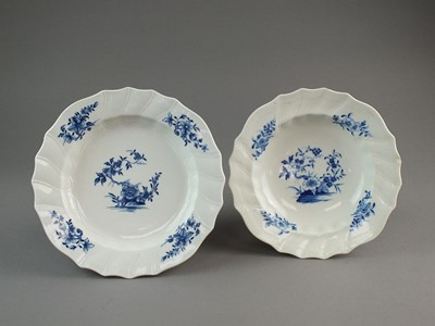 Lot 282 - Caughley soup plate and a Tournai soup plate, 18th century