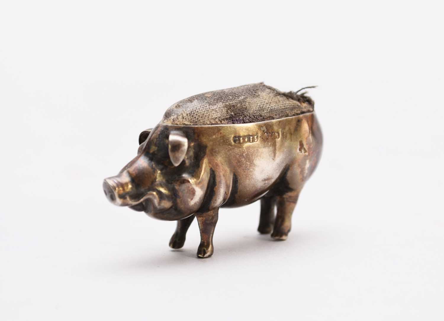 Lot 15 - An Edwardian novelty silver pin cushion in the form of a pig