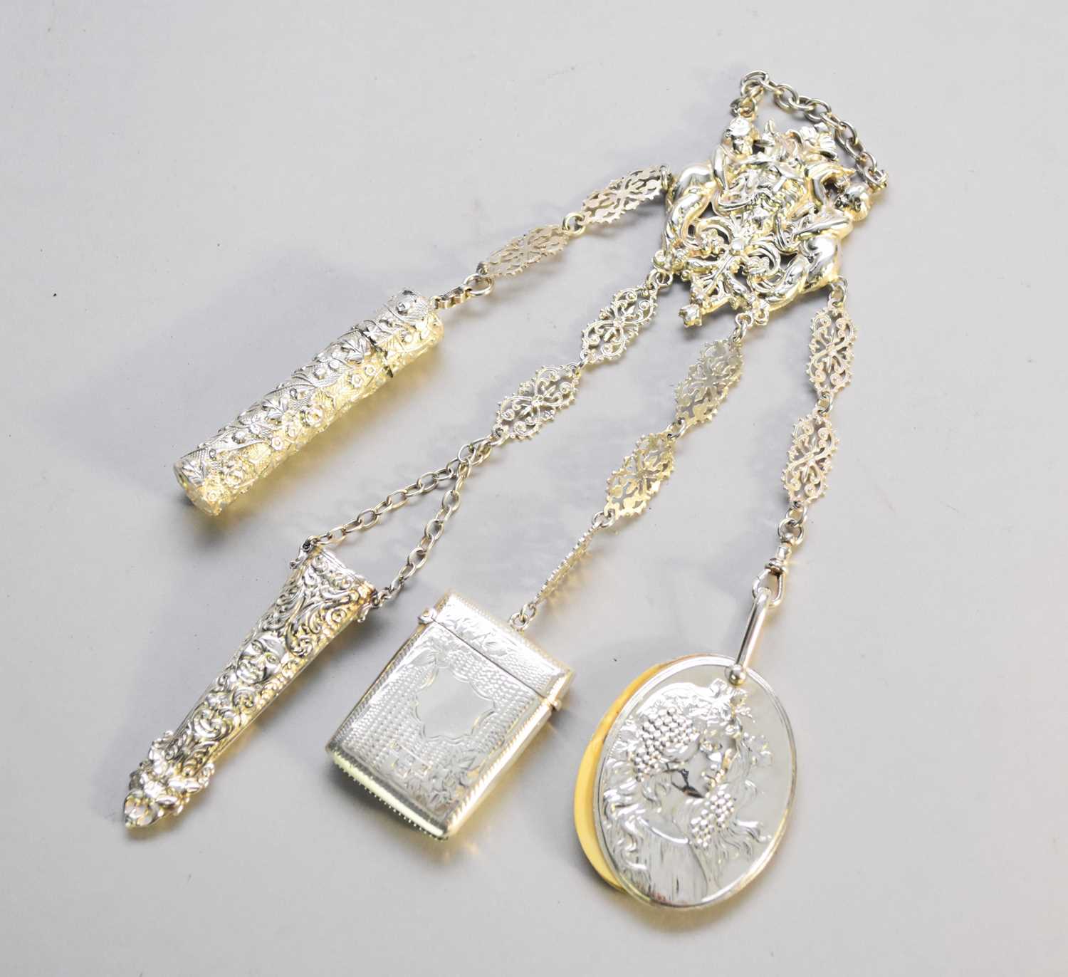 Lot 13 - A white metal chatelaine
