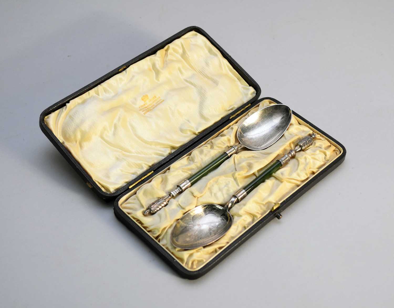 Lot 4 - A cased pair of silver spoons with jade handles
