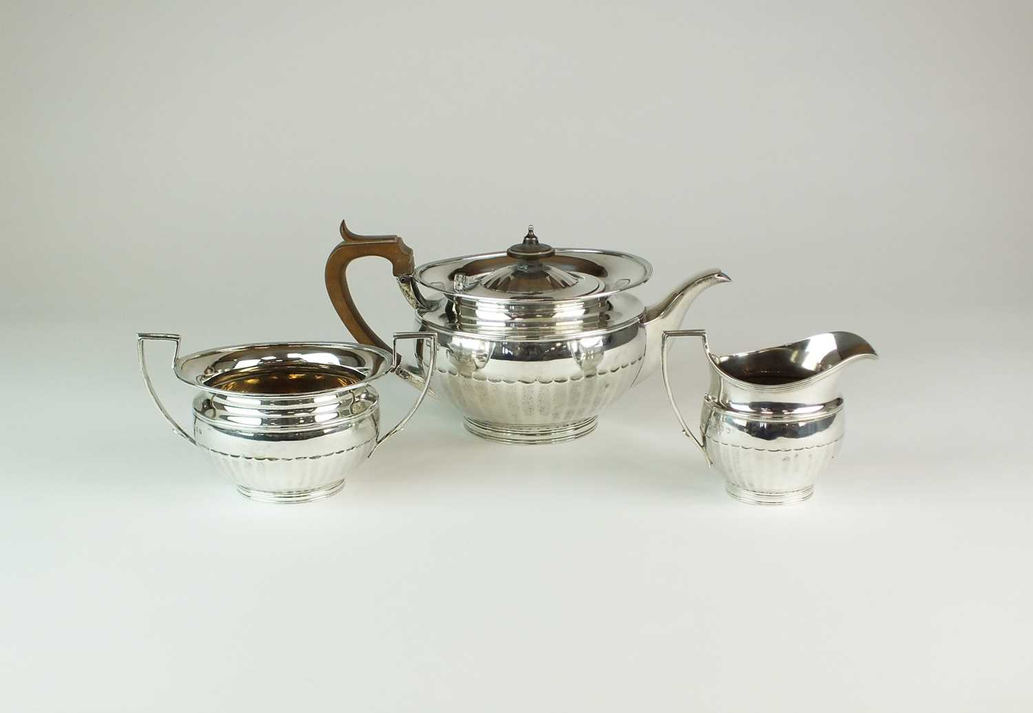 Lot 8 - A George V three piece silver tea service