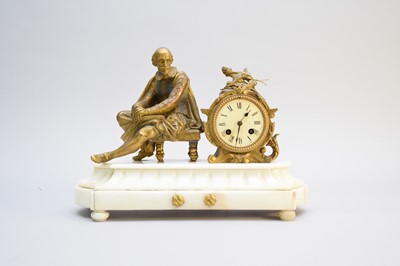 Lot 740 - Two French bronze and marble figural mantel clocks