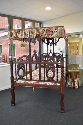 Lot 398 - An Indian canopied hard-wood double bed