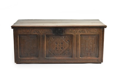 Lot 353 - A 17th century and later carved oak coffer